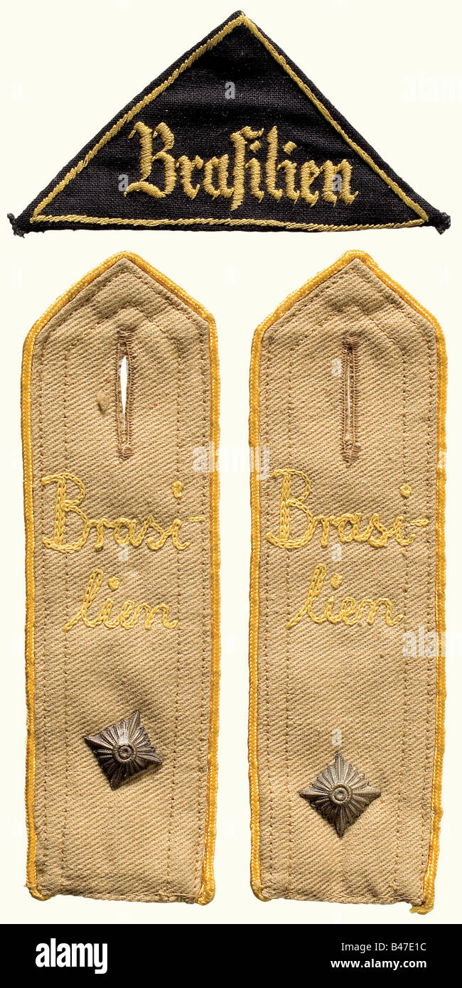 A triangular district badge and shoulder straps 'Brasilien', for a Hitler Youth Fellowship Leader. Black triangle with machine-embroidered yellow trim and inscription 'Brasilien'. Brown shoulder straps with yellow trim (the district colour for the American continent) and 'Brasilien' in machine embroidery, each with snap-fastener attachment. An extremely rare ensemble.' historic, historical, 1930s, 1930s, 20th century, League of German Girls, Band of German Maidens, youth organization, youth organizations, NS, National Socialism, Nazism, Third Reich, German Reic, Stock Photo