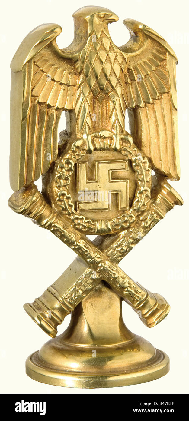 Hermann Göring - his personal seal as Reichsmarschall., Massively fashioned in silver and gilt. The shape of the seal is that of the shoulder board design of a Reichs Marshal's uniform i.e., a national eagle with half-spread wings above an oak leaf wreath with swastika and the crossed Reichsmarschall's batons. The seal base is carved in a large, helmeted Göring family coat of arms with the surrounding inscription 'Reichsmarschall Hermann Göring'. Deeply impressed on the reverse is the mark of the Berlin jeweller Herbert Zeitner and hallmark of fineness '925' wi, Stock Photo