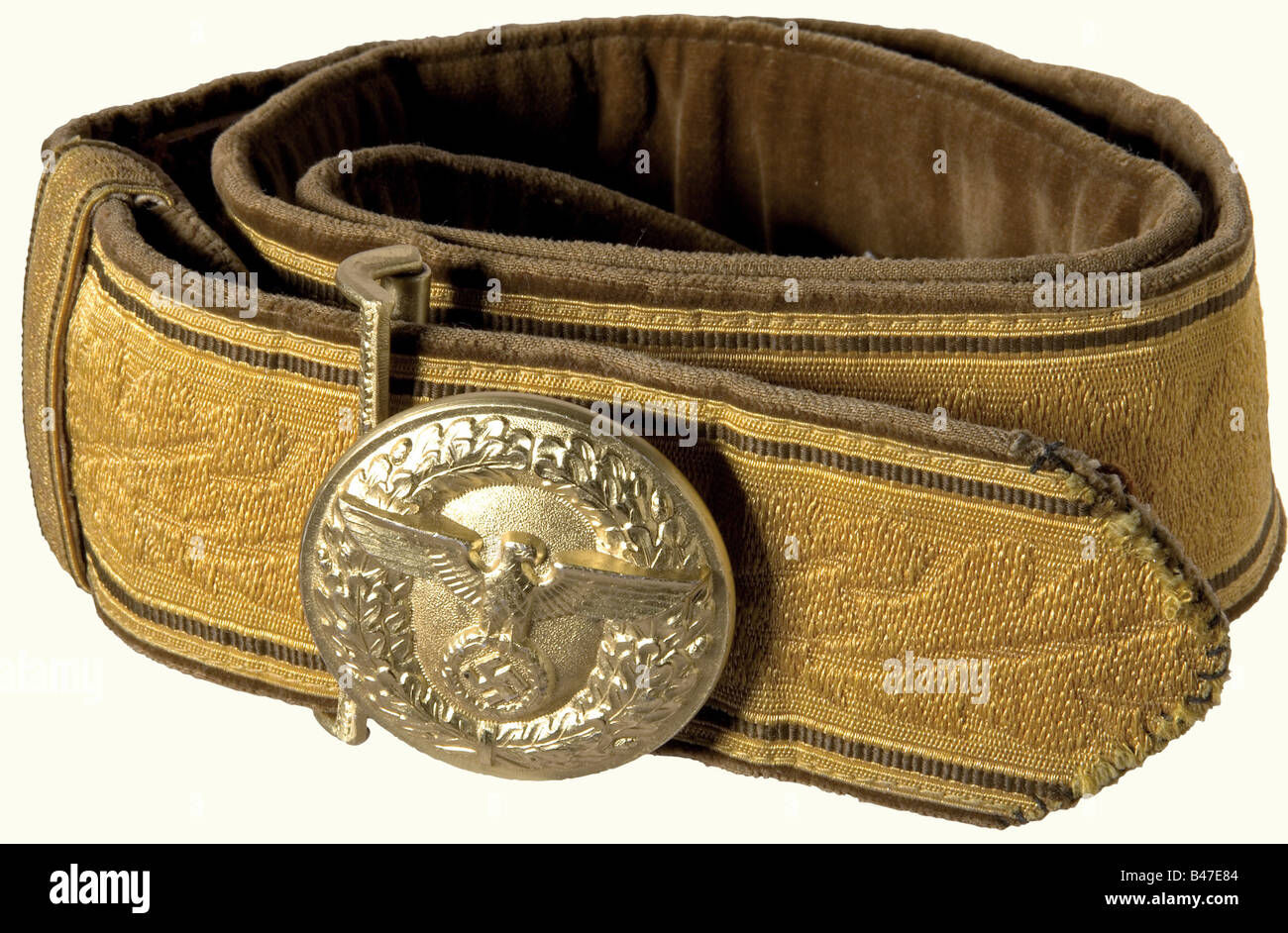 A parade belt for a Political Leader., Gold-coloured cello version with oak leaf decoration, brown velvet backing, golden anodized buckle (diameter 50 mm, manufacturer 'M4/24') and catch. Shortened. One of the two slides is missing, two small holes.' historic, historical, 1930s, 1930s, 20th century, party organisation, party organization, organisations, organizations, organization, organisation, party, parties, political party, German, Germany, NS, National Socialism, Nazism, Third Reich, German Reich, utensil, piece of equipment, utensils, object, objects, sti, Stock Photo