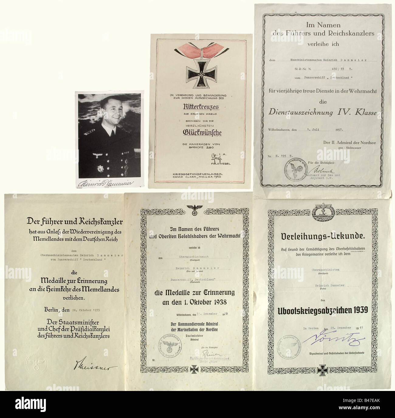 Citations of the Knight's Cross Winner, Chief Machinist Mate Heinrich Dammeier., Citation folder for the Sports Badge in Bronze for 8 December 1933, issued by the II Naval Artillery Detachment. Citations for Distinguished Service IV Class for 1 June 1937, for the Memelland Medal for 26 October 1939, and for the Commemorative Medal '1st October 1938' for 31 December 1939, during his service on board the armoured ship 'Deutschland'. Citation for the U-Boot Combat Badge for 29 December 1941. Calligraphic map in colour with congratulations for the Knights Cross fro, Stock Photo