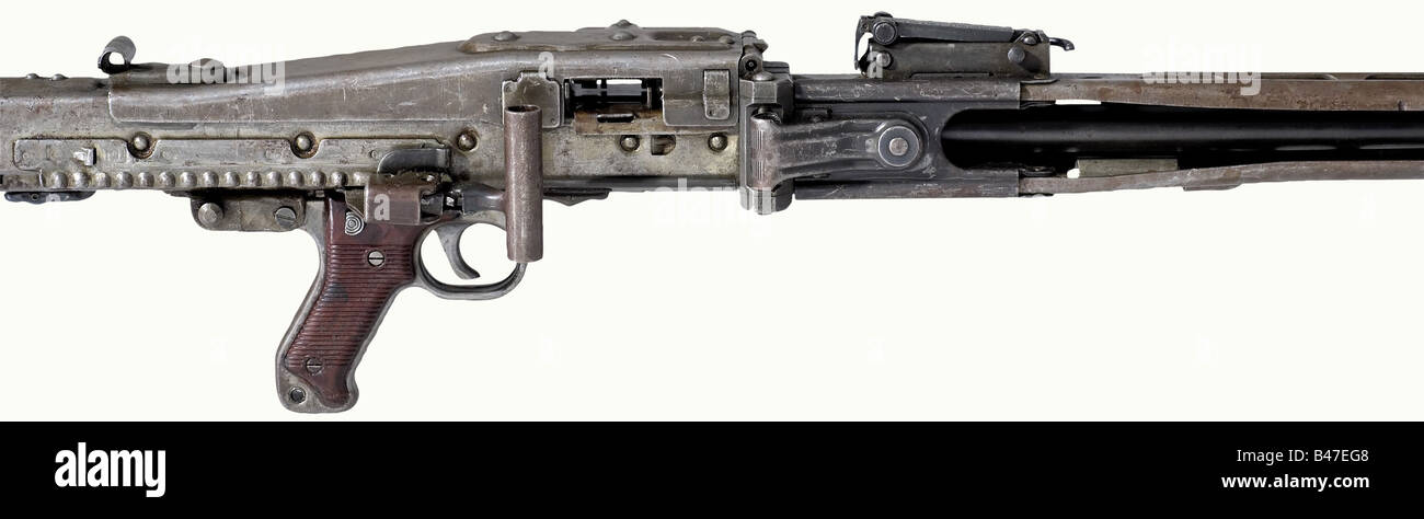 A light machine gun 42, 'MG 42', calibre 8 x 57, no. 4865c. Mirrorlike bore. Housing coded 'dfb/12' in a shield (Gustloff-Werke, Suhl), the cap coded 'bpr' (Großfuss Metallwarenfabrik, Döbeln), grip frame with 'WaA510' acceptance, lock coded 'duv' (Berlin-Lübecker Maschinenfabrik, Lübeck). Sight adjustment 200 - 2000 m, folding sight lever, anti-aircraft sight and foresight holder. The machine gun of late production is approx. 70 % thinly phosphated grey/green, the rest in a brownish patina, partially without any finish and spotty. Grip of co historic, historic, Stock Photo