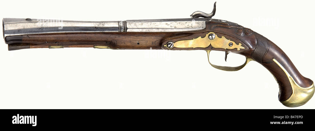 A pair of percussion blunderbuss pistols, Joseph Stöckl in Neustadt/Vienna, circa 1760. Two-stage barrels, the breech section octagonal then round with wide, horizontally oval belled muzzles. On top of the barrels engraved signatures next to rocaille ornamentation. Converted locks. Lightly carved walnut full stocks with horn nose caps and smooth brass furniture. Wooden ramrods with horn tips. Length of each 44 cm. historic, historical, 18th century, civil handgun, civil handguns, handheld, gun, guns, firearm, fire arm, firearms, fire arms, weapons, arms, weapon, Stock Photo