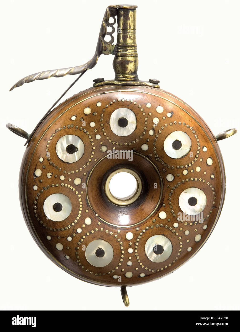 A German priming flask, circa 1600. Ring shaped fruitwood body richly  inlaid with brass, mother-of-pearl, bone, and black horn. Spring-loaded  fire-gilded brass nozzle. Three carrying rings. Size 16.5 cm. historic,  historical, 17th