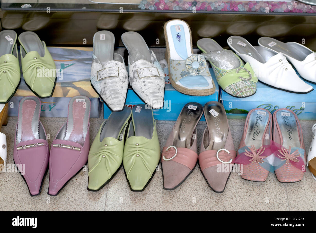 Womens shoes for sale assorted colours in pairs Stock Photo Alamy