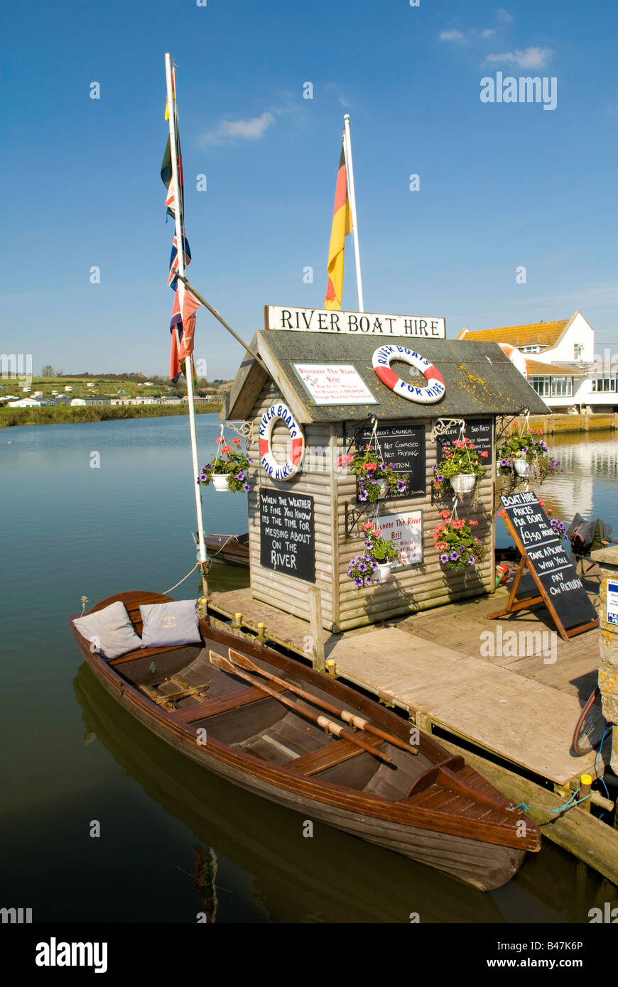 Boat hire kiosk, River Brit, West Bay, near Bridport, Dorset, UK Stock Photo