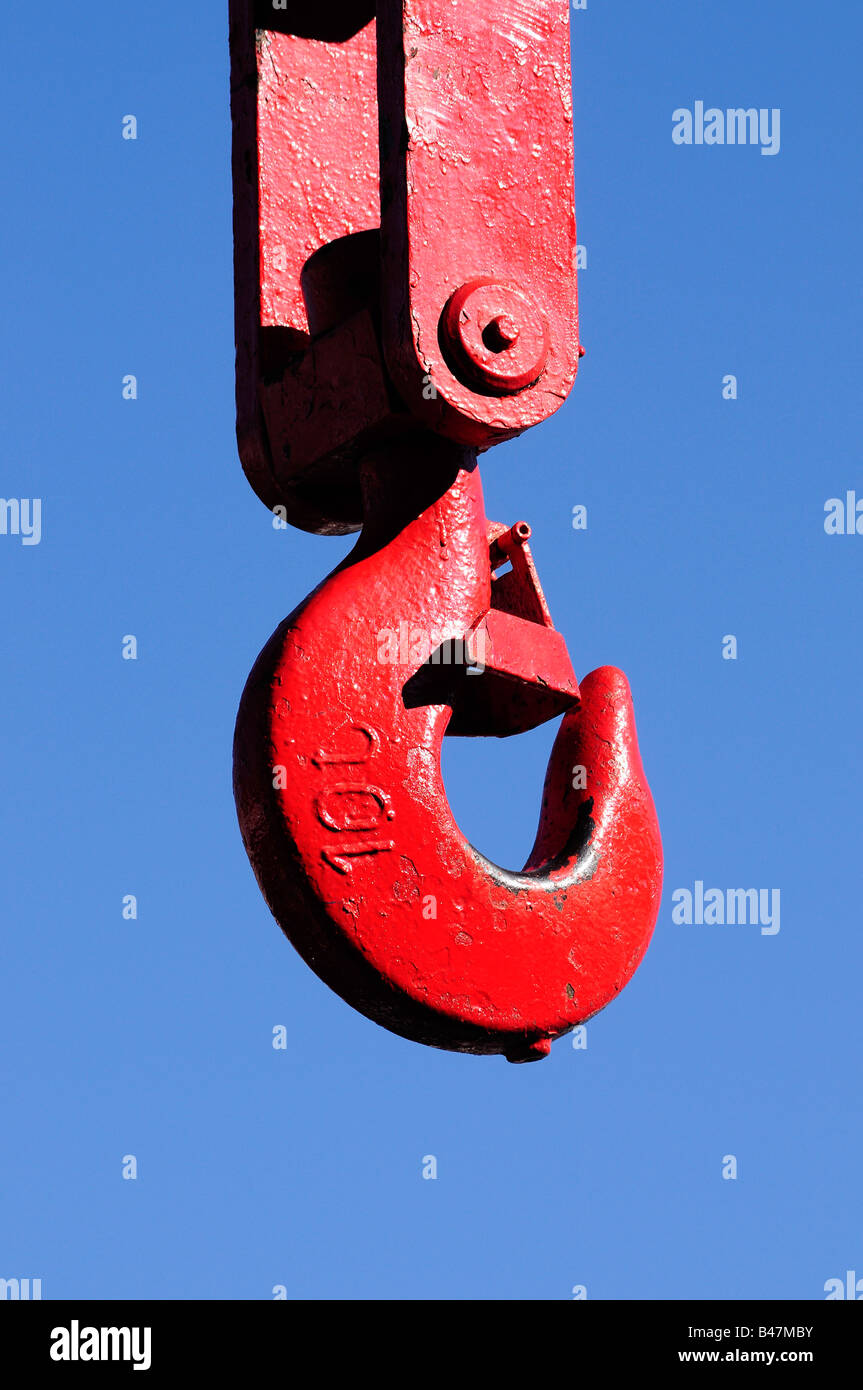 A cranes hook painted red against a blue sky. Picture by Patrick Steel patricksteel Stock Photo