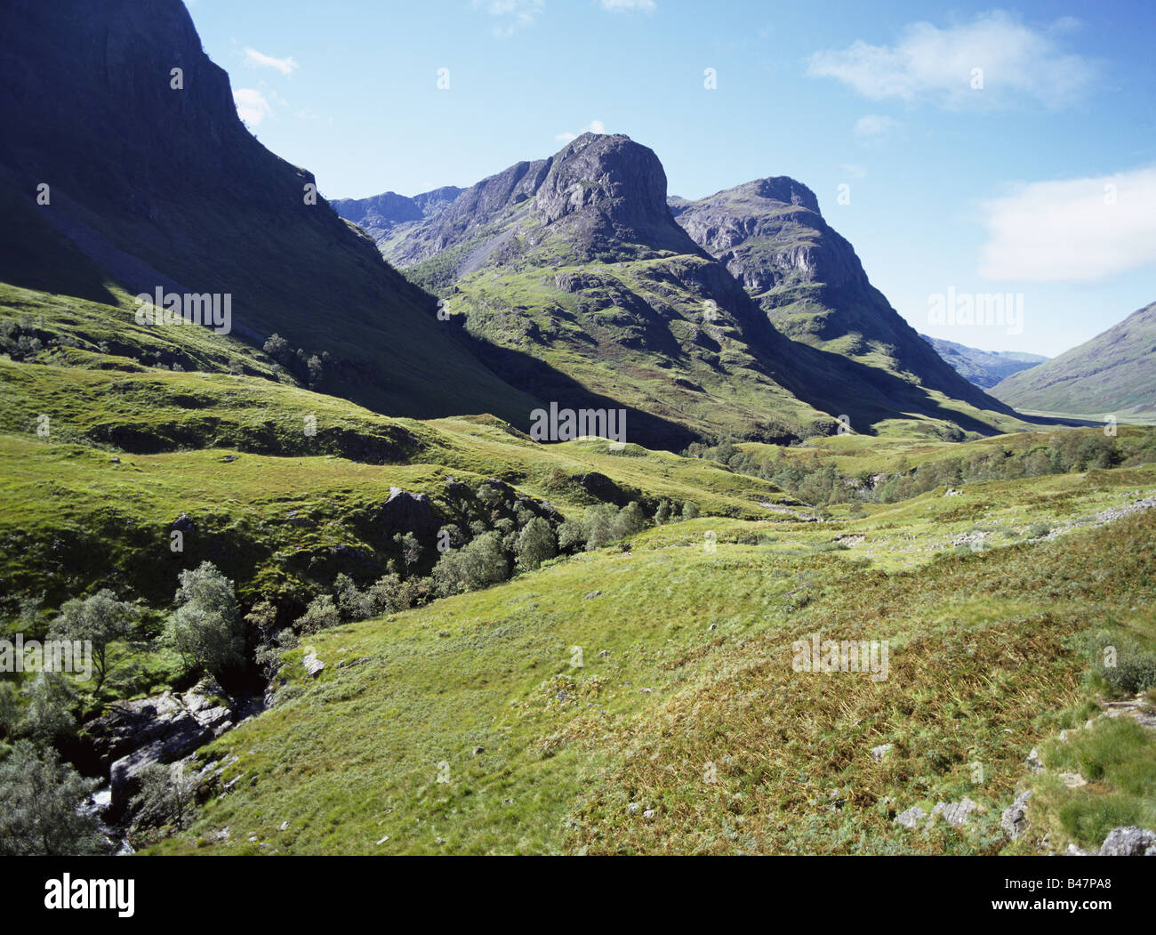 dh The Three Sisters glen coe GLENCOE ARGYLL Rugged Scottish valley craggy mountainous peaks scotland munros mountains Stock Photo