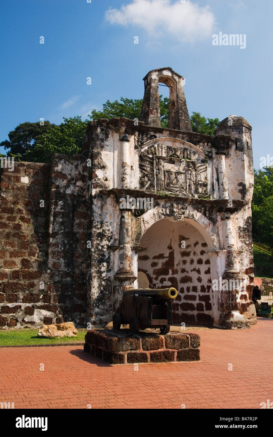 Cannon in front of Porta de Santiago at A Famosa originally constructed by the Portuguese in 1511, then restored by the Dutch in Malacca, Malaysia Stock Photo
