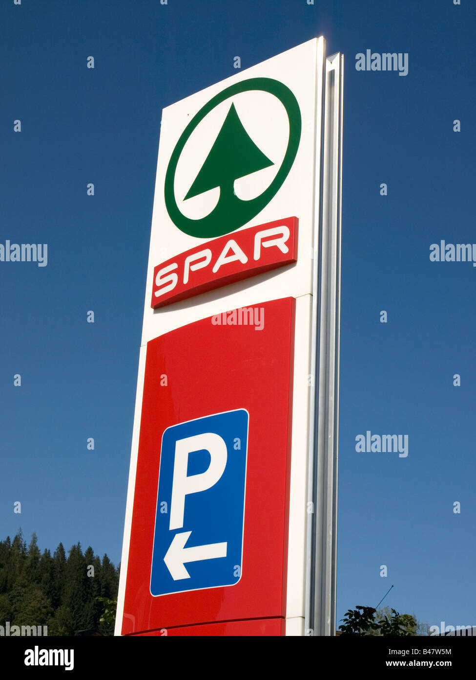 Spar supermarket and parking sign with fir tree logo Oberau Austria Stock Photo