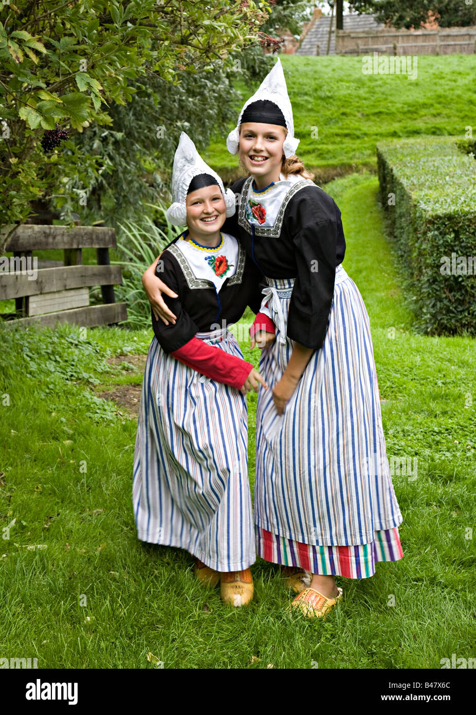 Two girls dressed in traditional Dutch costume Zuiderzeemuseum ...