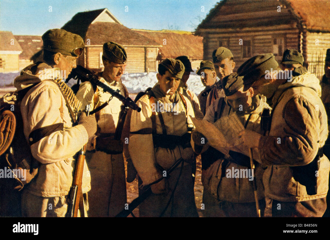 Wehrmacht Snow Patrol German infantry look at the map in the Norwegian campaign in WWII Stock Photo