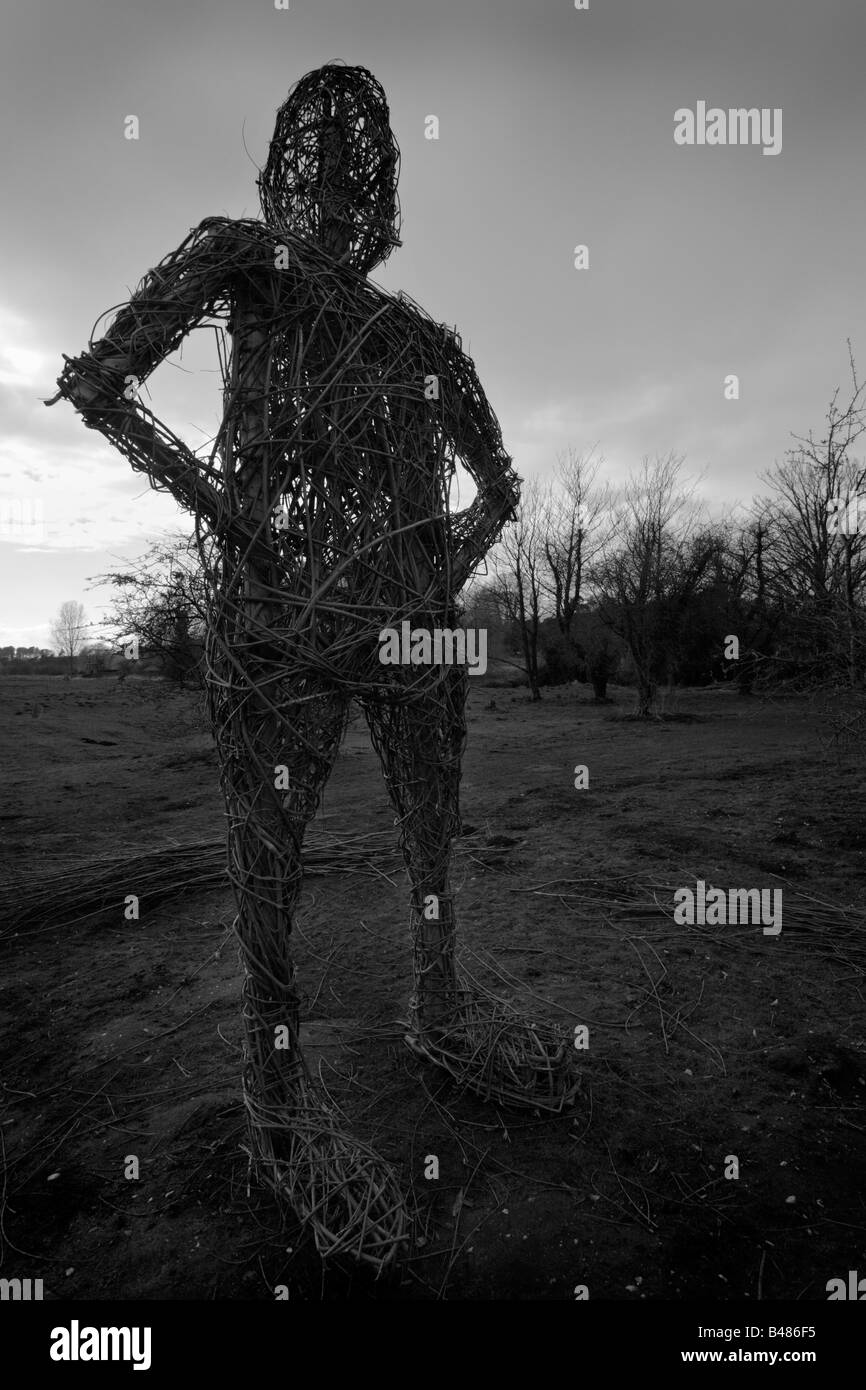 Black and white image of a wicker man at Cockley Cley Iceni village in Norfolk, England. Stock Photo