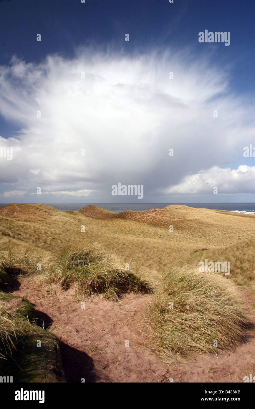 Sandwood Bay on the Cape Wrath Trail with approaching snow shower Stock Photo