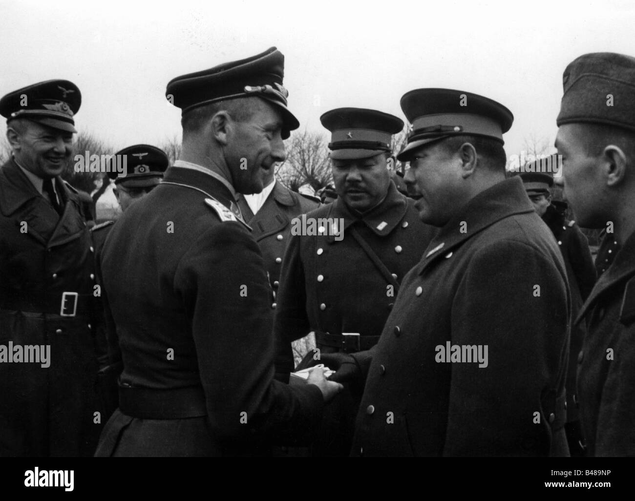 Nazism / National Socialism, politics, Tripartite Pact, visit of Japanese General Yamashita at German airforce 53, France, late 1942, greeting, Yamashita Tomoyuri, commander-in-chief of Japanese forces in Manchuria, Pact of Steel, military, air force, officers, uniform, Nazi Germany, Japan, Third Reich, Wehrmacht, Alliance, KG 53, Second World War / WW II, historic, historical, 20th century, 1940s, people, Stock Photo