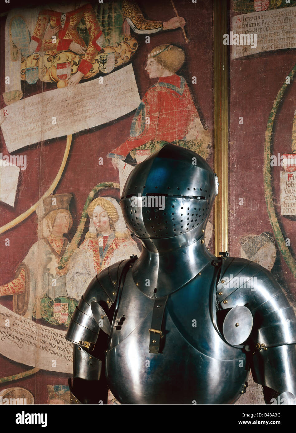 weapons / arms, defensive arms, armour, plate armour for Frederic I (the Victorious), Elector Palatine (1425 - 1476), by Inocenzo da Faerno, Tomaso and Antonio Missaglia, Milan, circa 1450, upper part, Habsburg family tree from 1497 in the background, Museum of Art History, Vienna, collection of arms and armour, Stock Photo