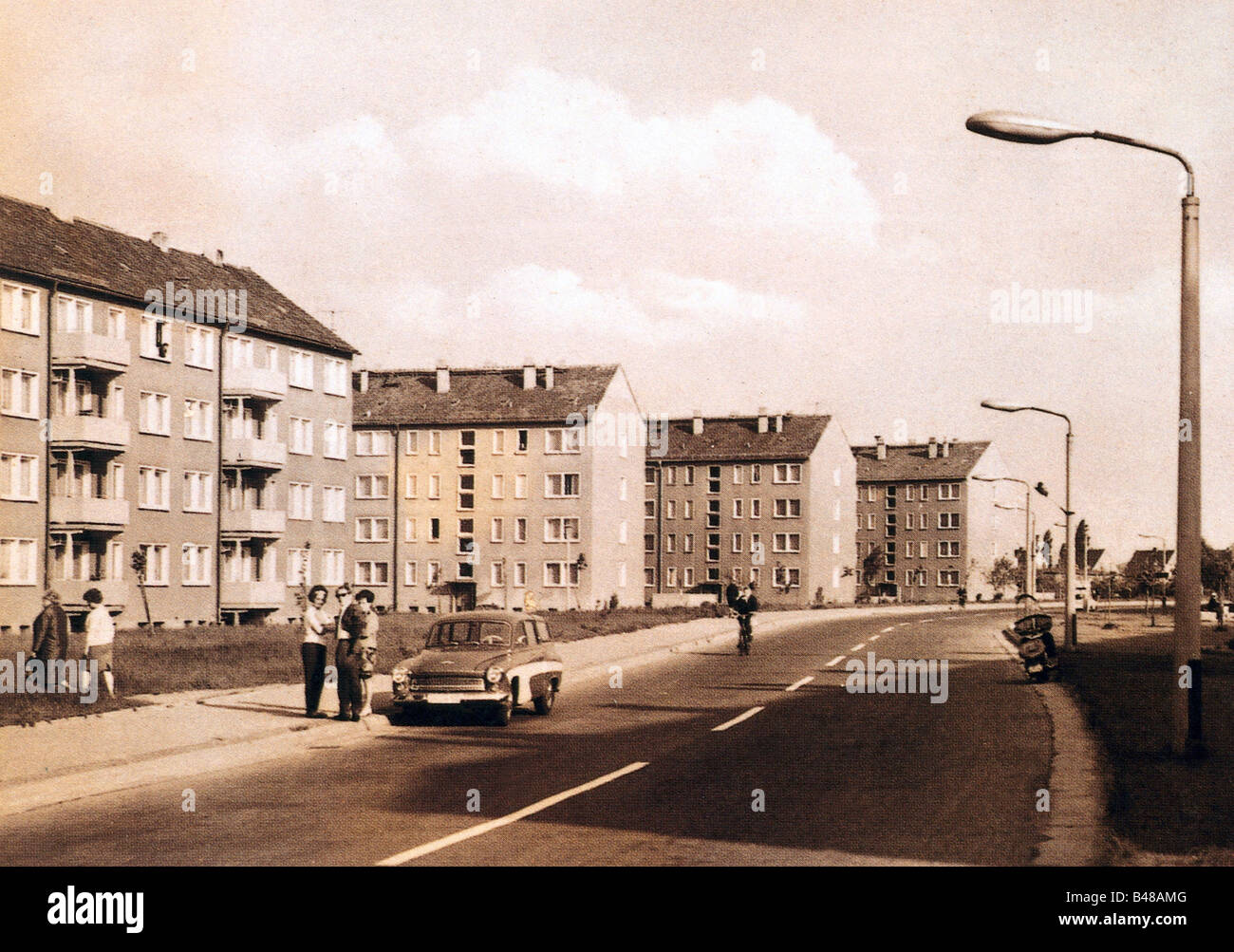 geography / travel, Germany, GDR, Eilenburg - East, street scenes, Rosa-Luxemburg-Straße, 1970s, 70s, historic, historical, passenger car, automobile, Eastern bloc, settlement, province, provincial town, Rosa-Luxemburg-Strasse, East Germany, DDR, German Democratic Republic, 20th century, people, Stock Photo