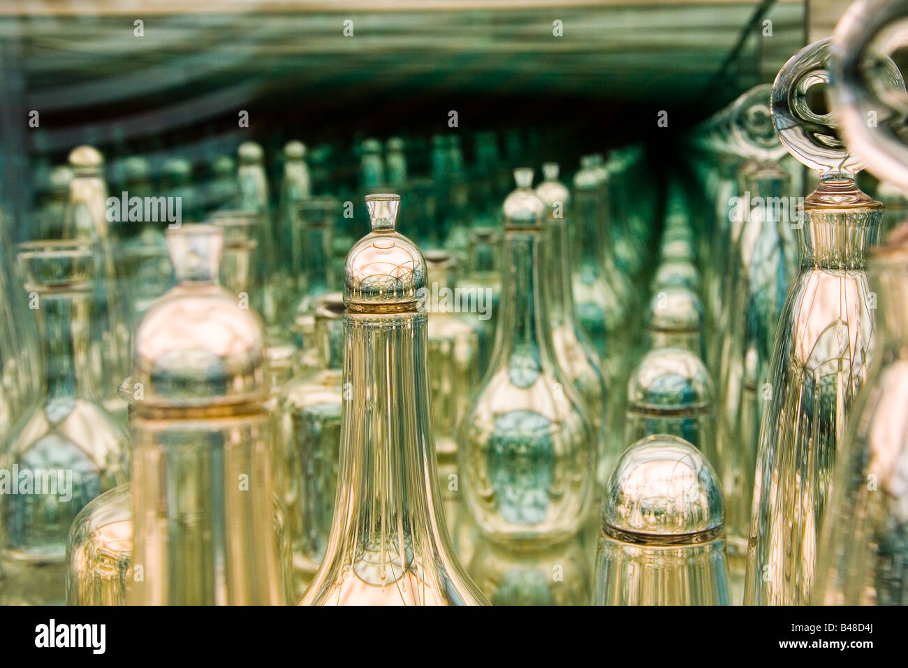 Glass decanters reflected to infinity Stock Photo