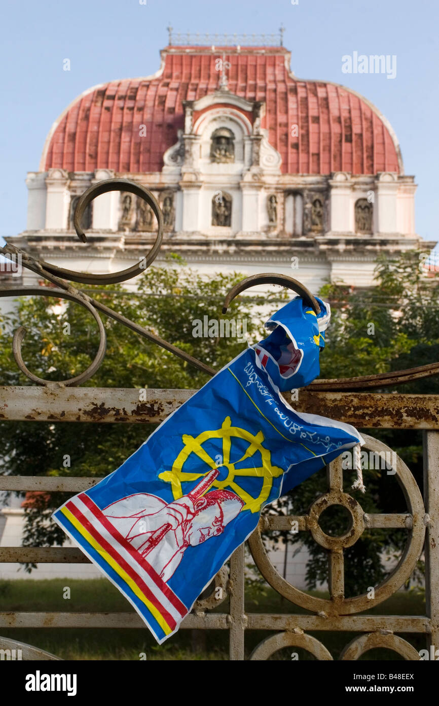 The flag of a political party hangs on a fence by the Oriental Research Institute (ORI) in Mysore, India. Stock Photo