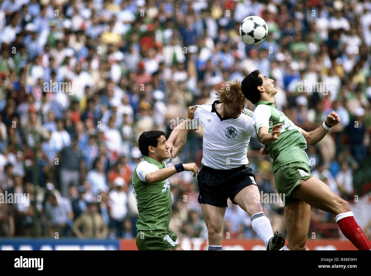 Sport / Sports, soccer, football, World Cup 1982, final round, Algeria against Germany (2:1) in Gijon, Spain, 16.6.1982, scene with Horst Hrubesch, header, match, historic, historical, 20th century, people, 1980s, Stock Photo