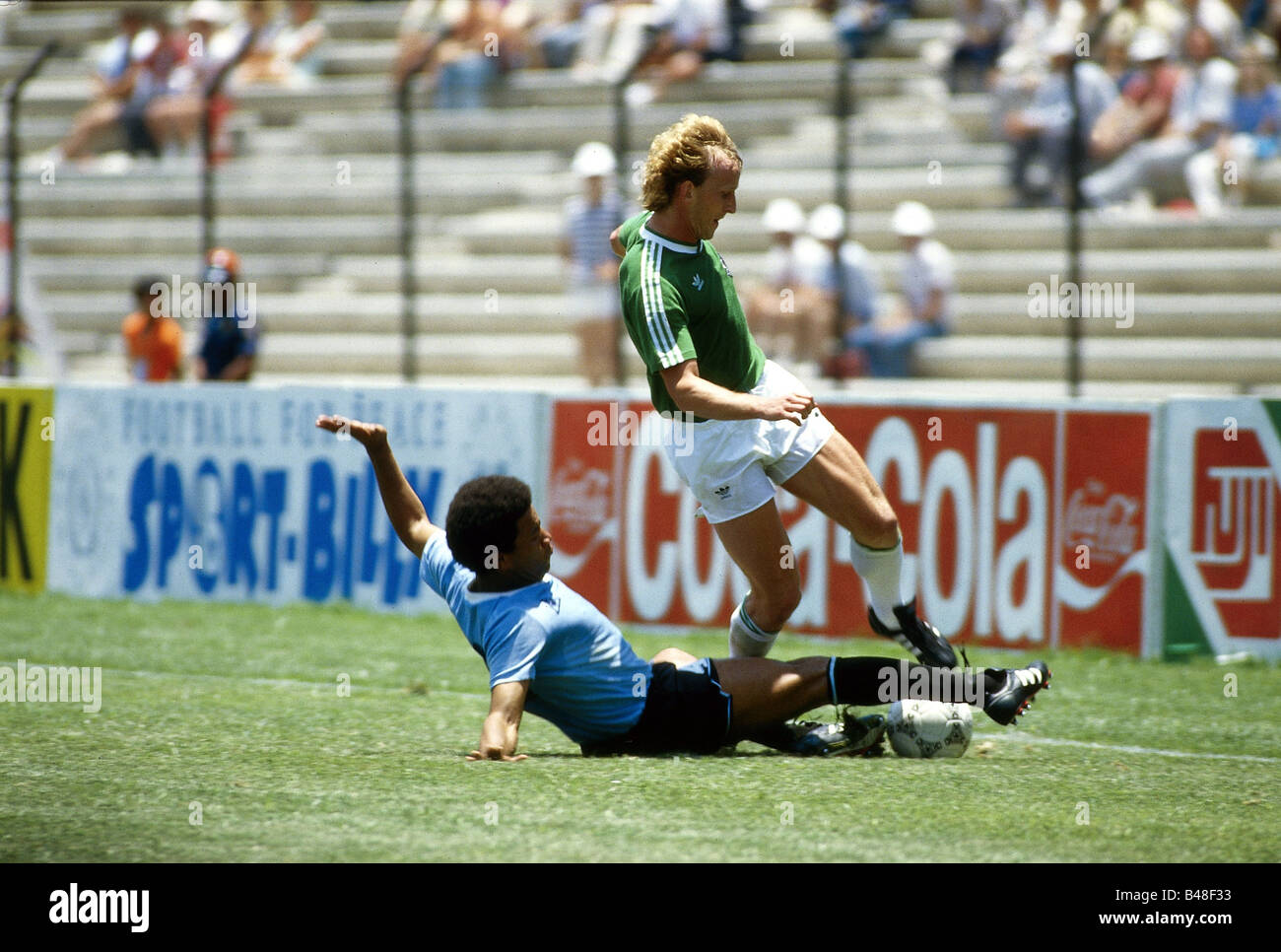 Sport / Sports, soccer, football, World Cup 1986, final round, group match, Germany against Uruguay, (1:1) in Queretaro, Mexico, 4.6.1986, scene with Andreas Brehme, duel, match, historic, historical CEAM, 20th century, people, 1980s, Stock Photo