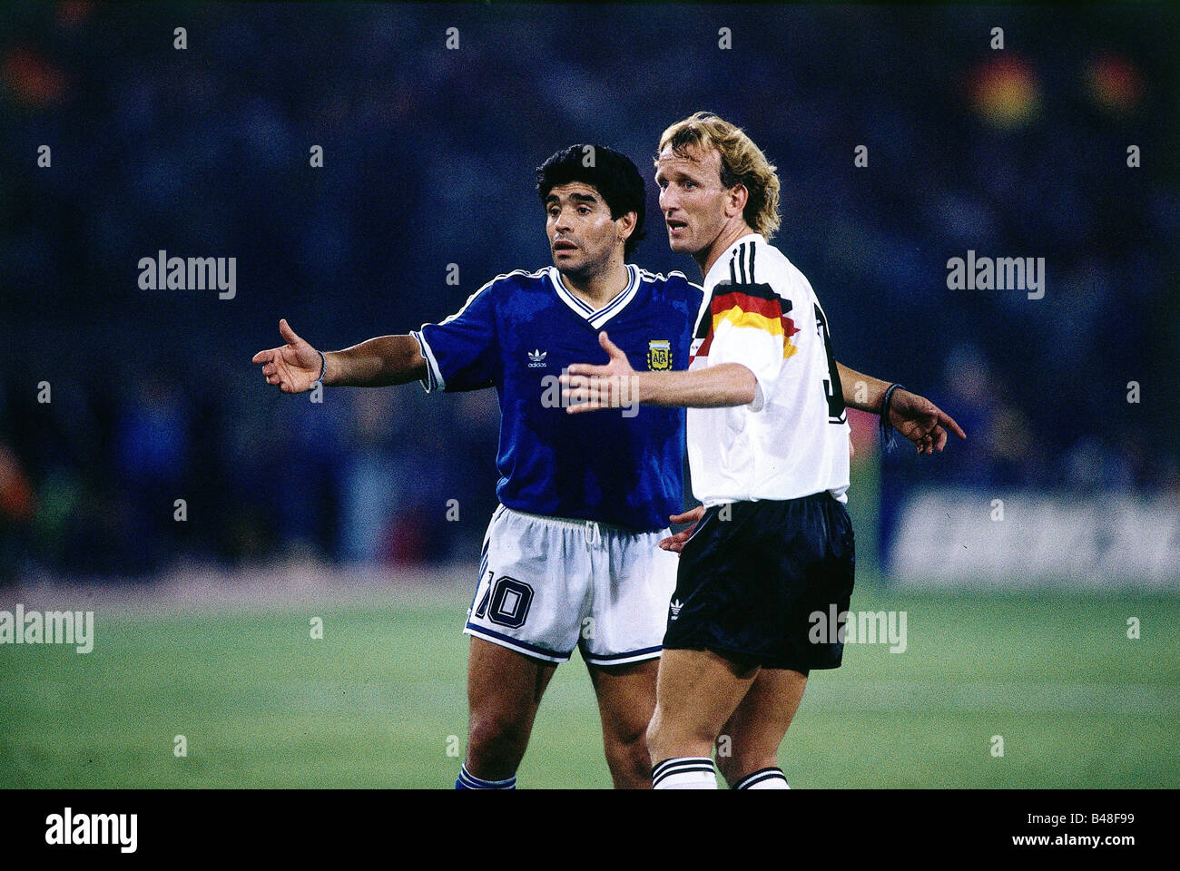 Sport / Sports, soccer, football, World Cup 1990, final round, final, Germany against Argentina, (1:0) in Rome, Italy, 8.7.1990, scene with Diego Maradona and Andreas Brehme, match, historic, historical, 20th century, people, 1990s, Stock Photo