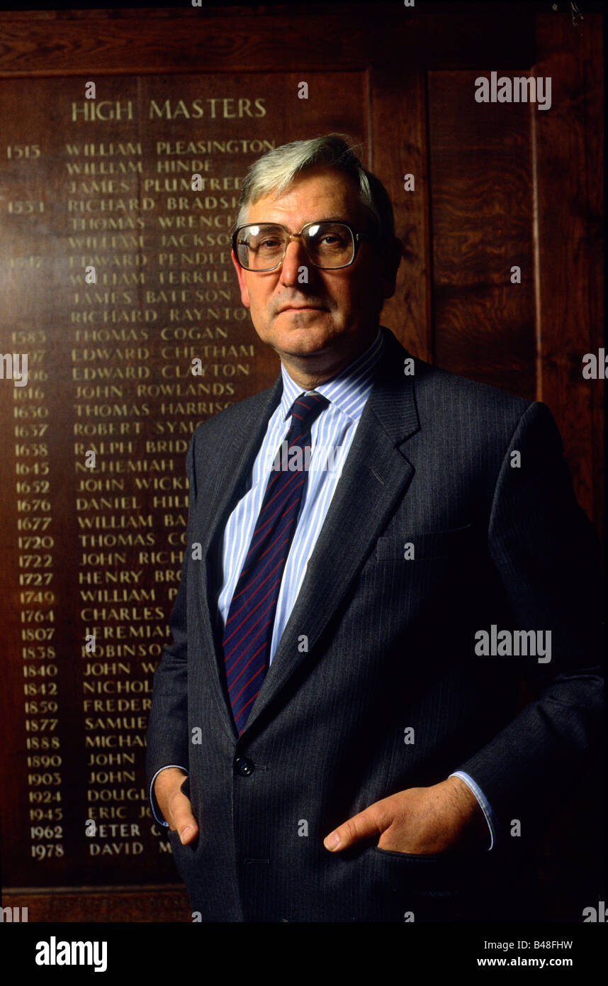 Manchester Grammer School High Master, standing in front of the list of previous High Masters Stock Photo