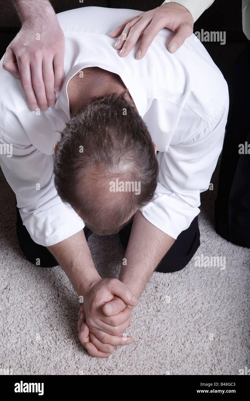 Praying On Knees High Resolution Stock Photography and Images - Alamy