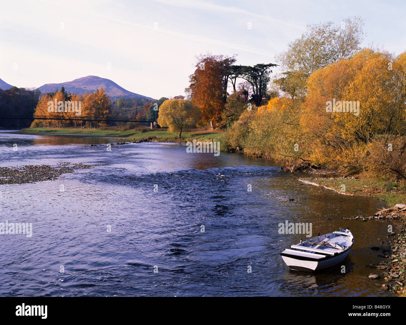 dh RIVER TWEED BORDERS Anglers rowing boat autumnal Eildon Hills autumn scotland scenic scottish st cuthberts way Stock Photo