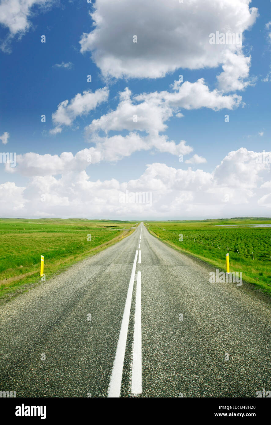 Empty rural road on a beautiful summer day Stock Photo