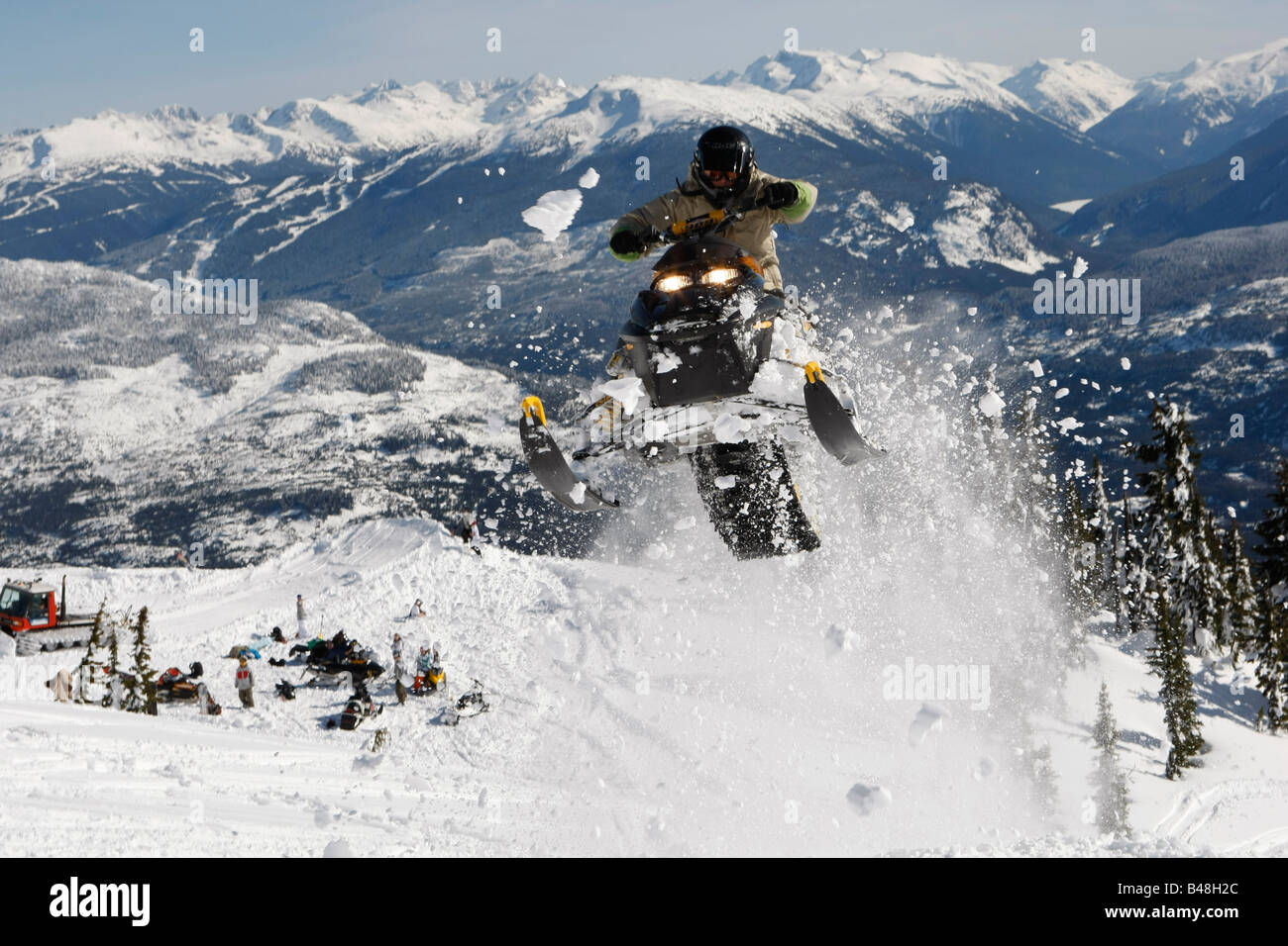 jumping a snowmobile catching big air Stock Photo - Alamy