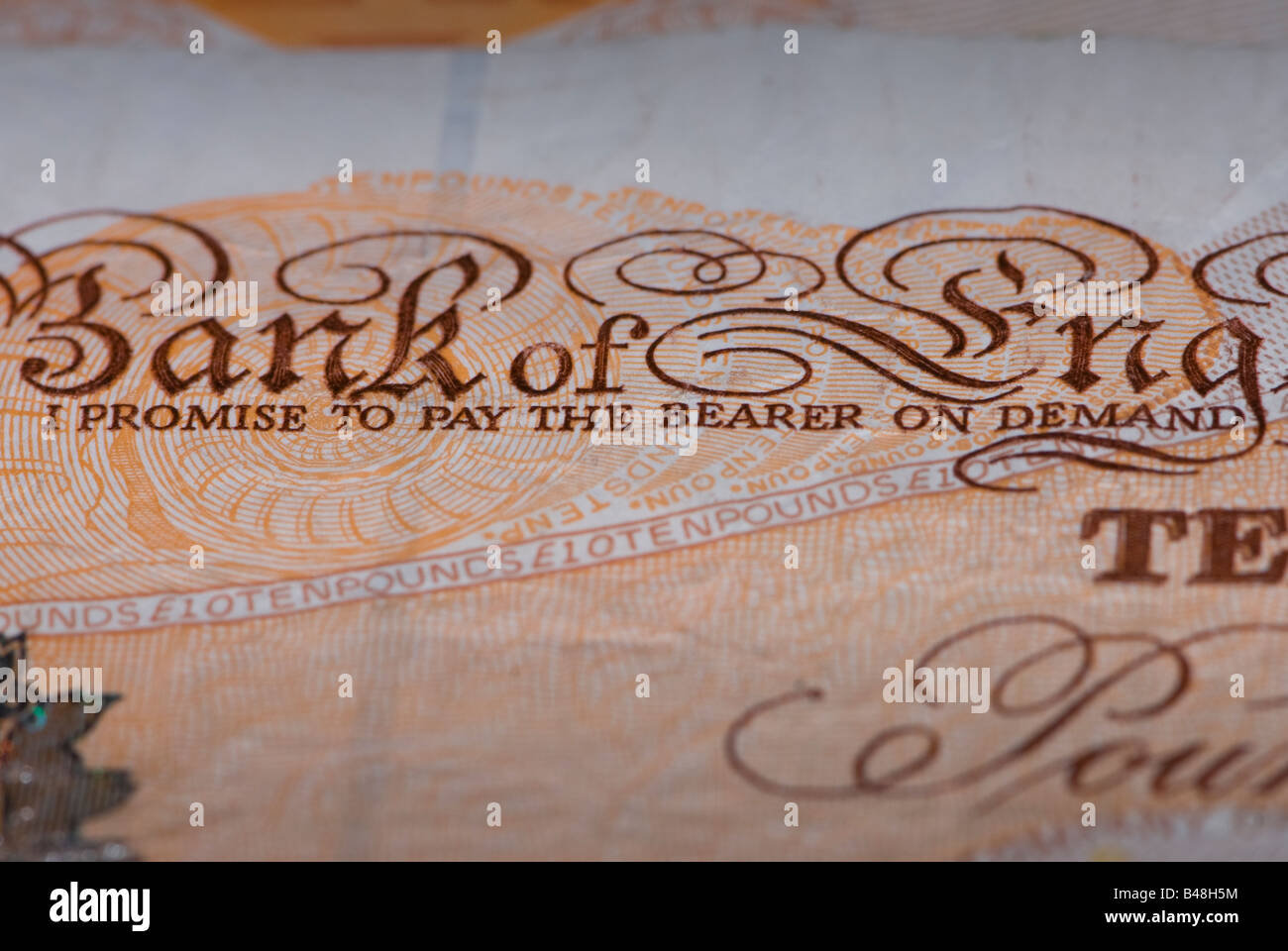 'I promise to pay the bearer on demand' on stirling ten pound note. Stock Photo