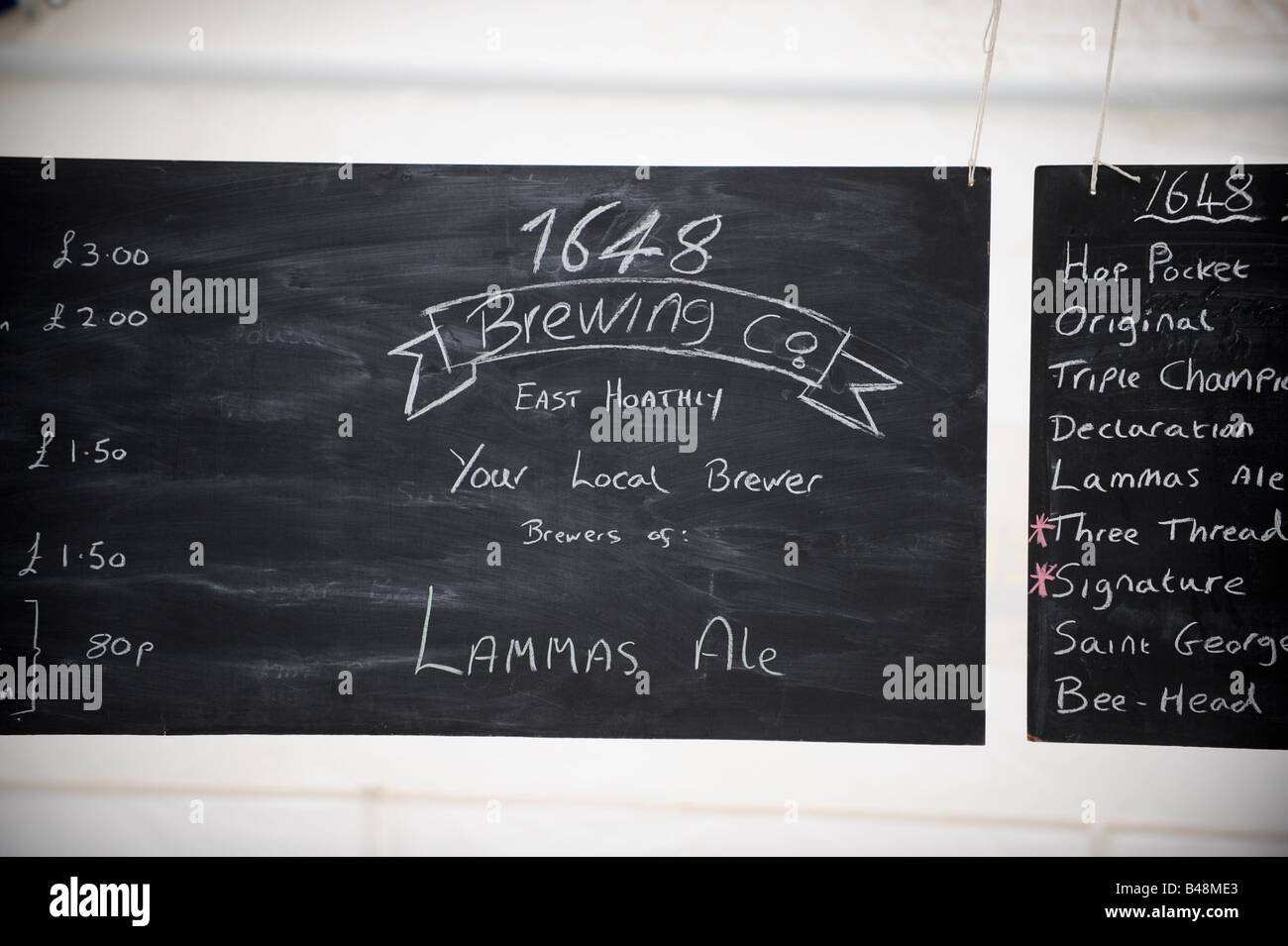 The 1648 Brewing Company: prices above the bar at the Lammas Beer festival Eastbourne 2008. Stock Photo