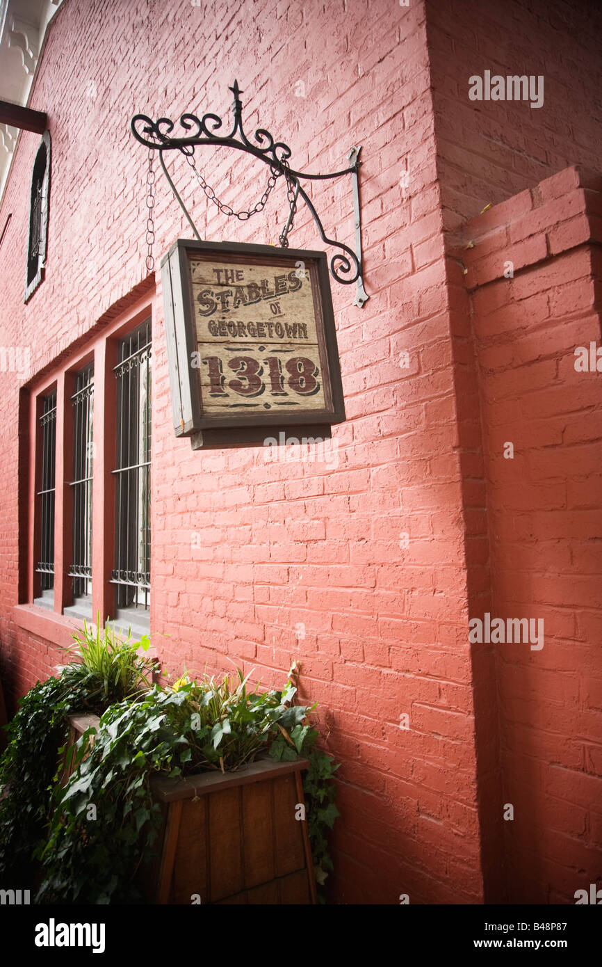 read-that-read-the-stables-of-georgetown-1318-hangs-from-the-exterior