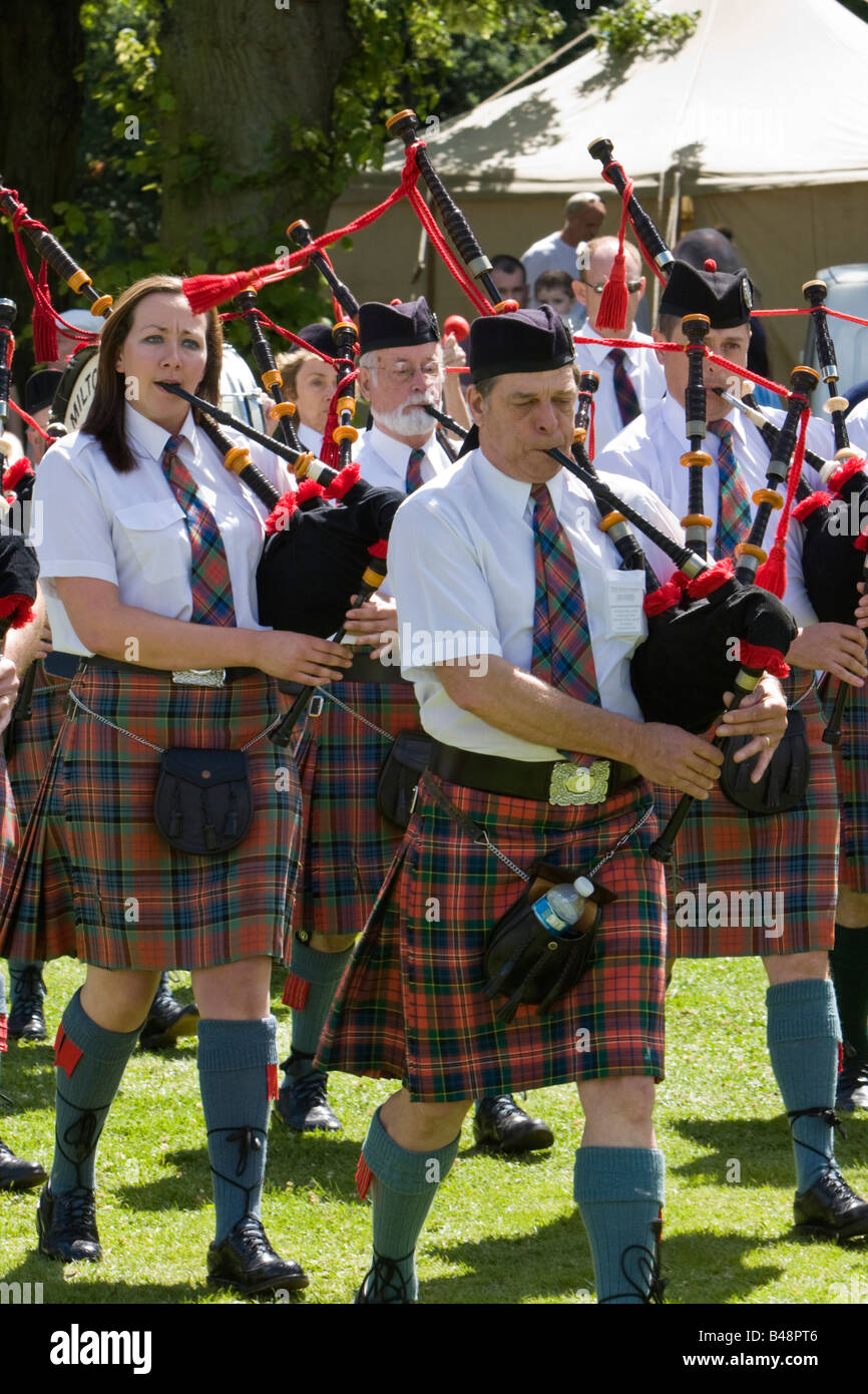 Marching playing the bagpipes hires stock photography and images Alamy