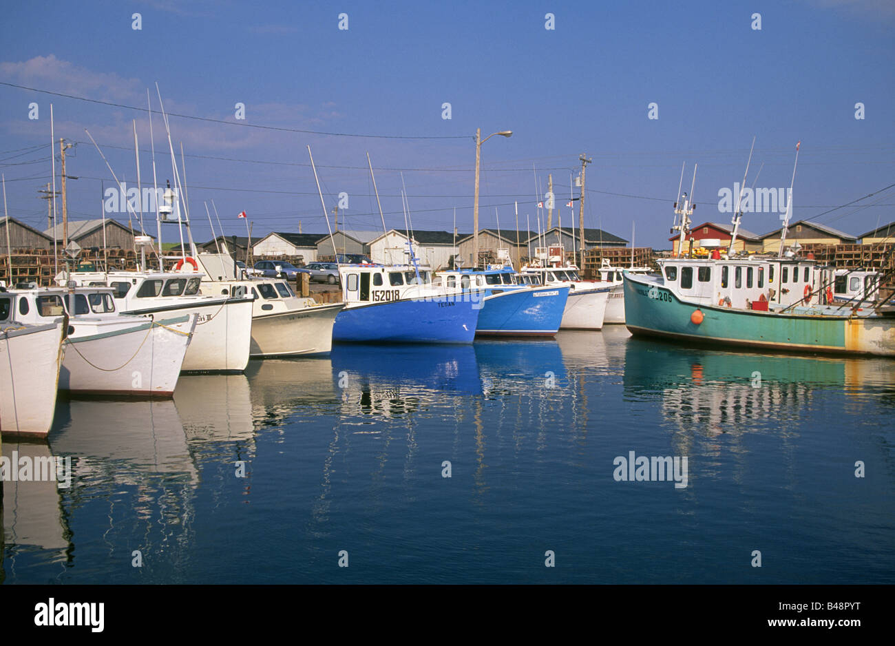 Fishing boats await the tide in a tiny colorful fishing village on the