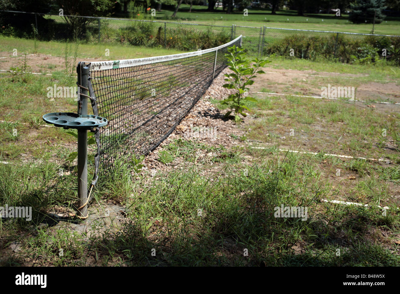 Old abandoned clay tennis court Stock Photo - Alamy