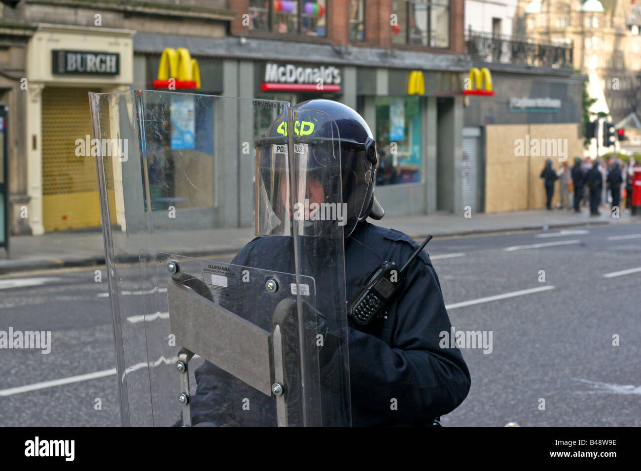 Riot policeman protecting Mcdonalds restaurant during G8 protests , Edinburgh, Scotland UK. Stock Photo