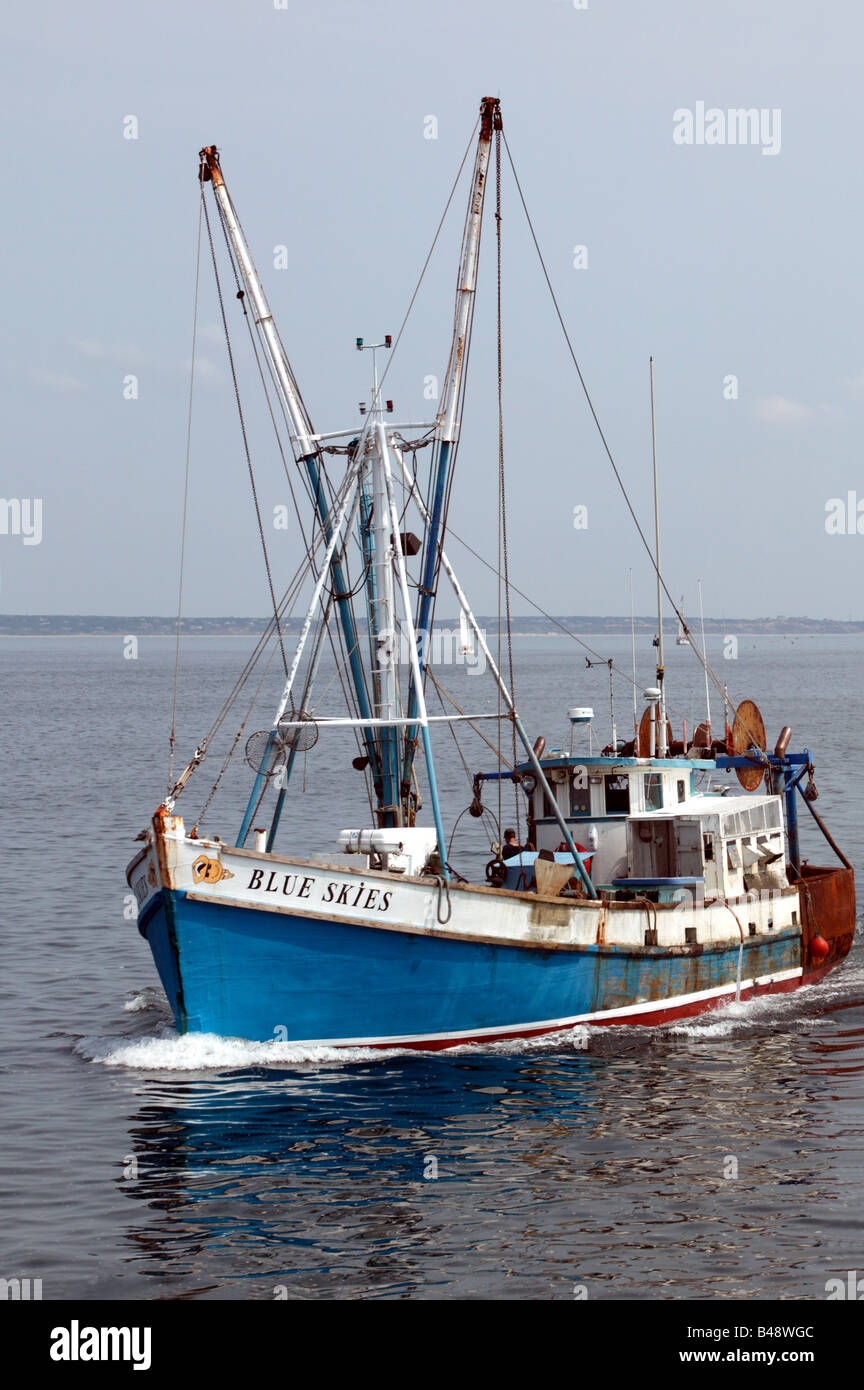 The Fishingboat 'Blue Skies' approaching Provincetown Harbour, Cape Cod, Stock Photo
