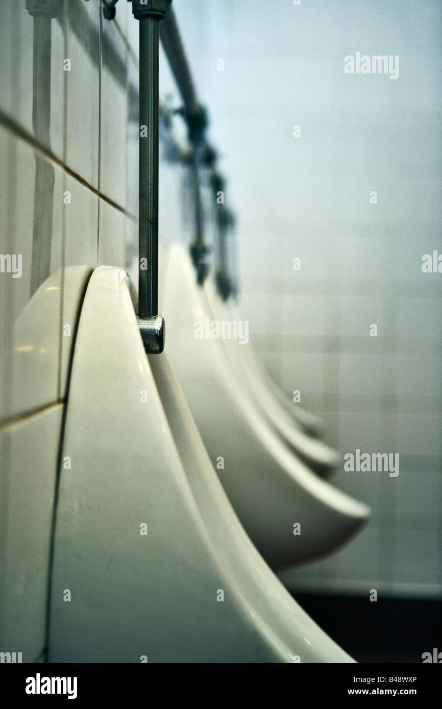Urinal in men's public lavatory Stock Photo Alamy