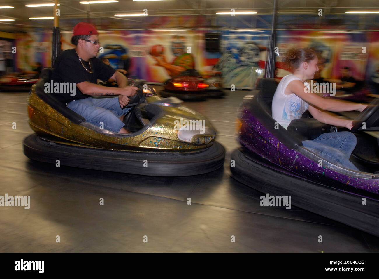 Visitors ride the bumber cars in Astroland in Coney Island in the ...