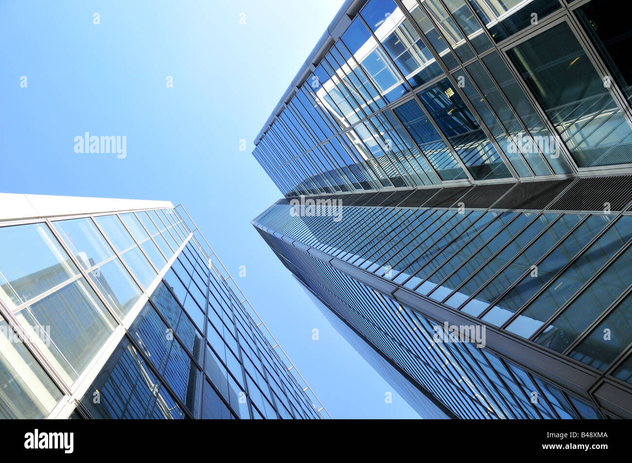 Office buildings - Modern architecture in City of London with blue sky, London England UK United Kingdom GB Europe Stock Photo