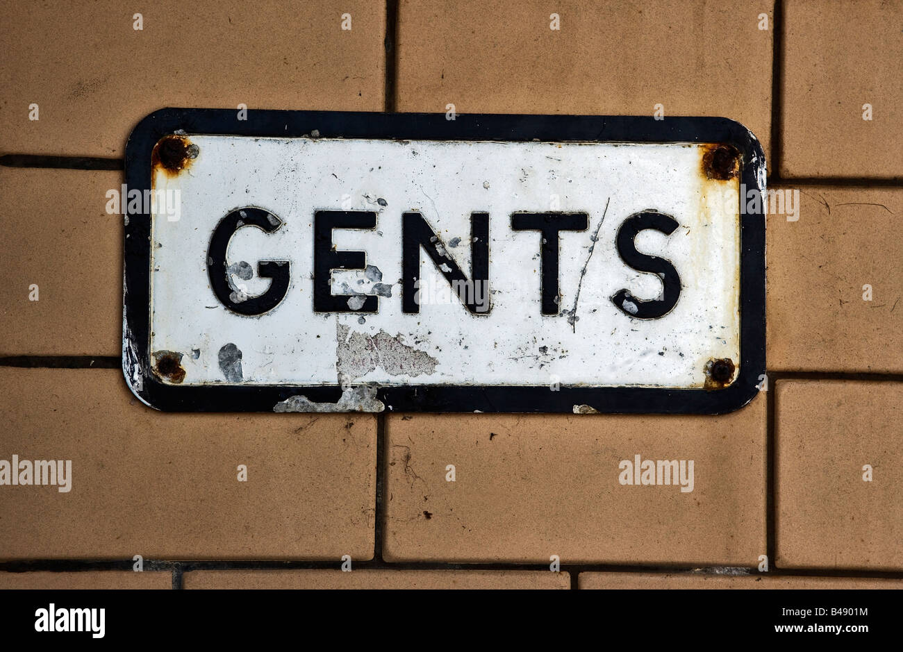 Vintage gents sign outside public lavatory, UK Stock Photo