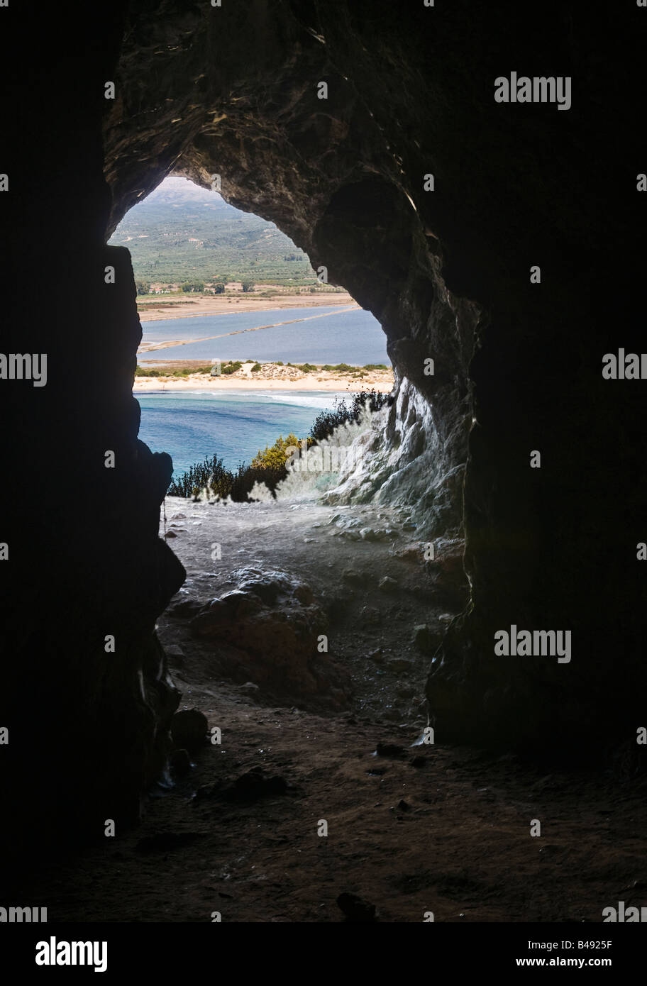Voidokilia bay and lagoon seen from inside Nestors cave on the hill above the bay, near Pylos, Southern Peloponnese Greece Stock Photo
