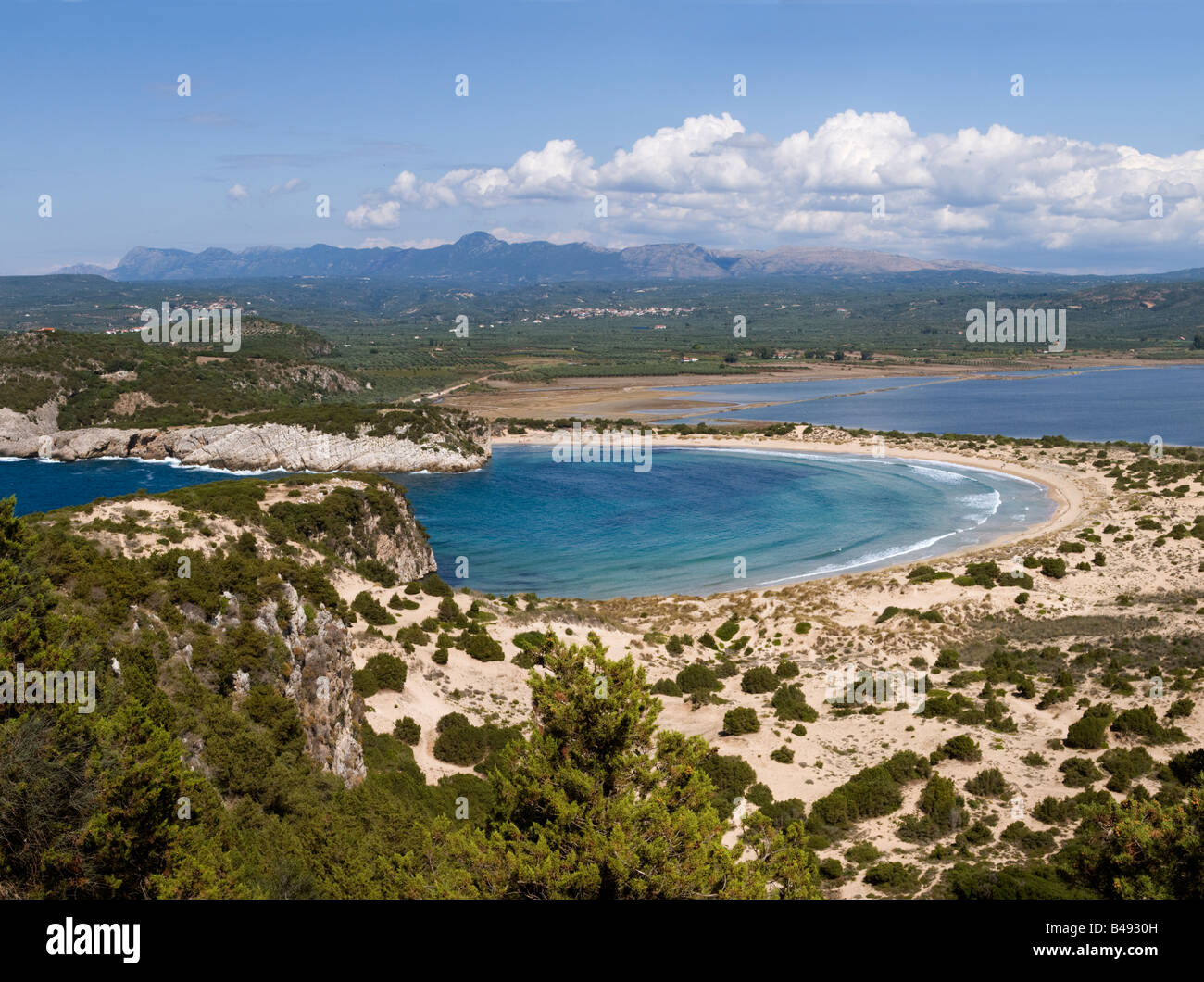 Voidokilia bay with the lagoon and bird conservation area in the background just north of Yialova and Pylos, Peloponnese Greece Stock Photo