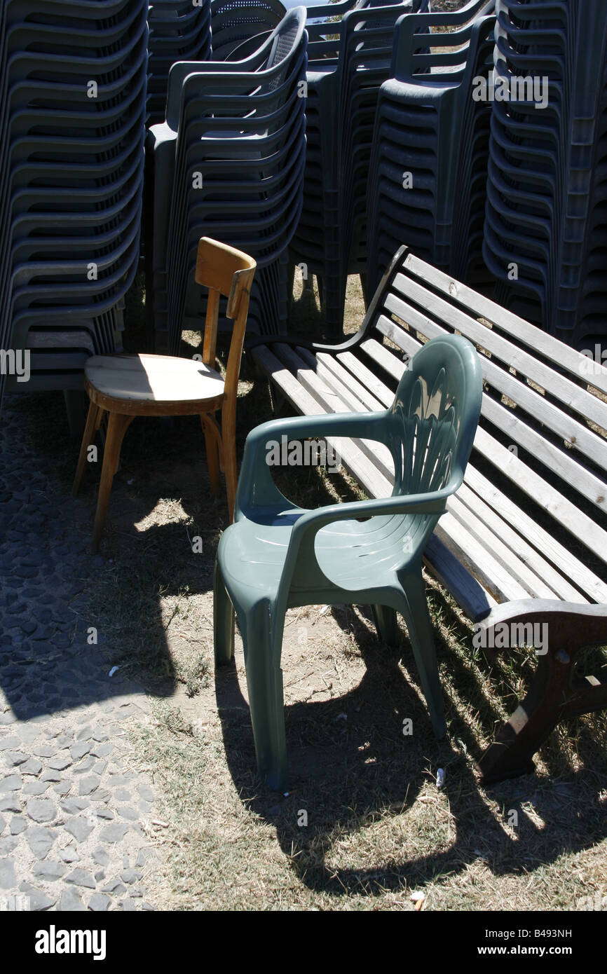 lots of vacant chairs in park outdoors in sun Stock Photo Alamy
