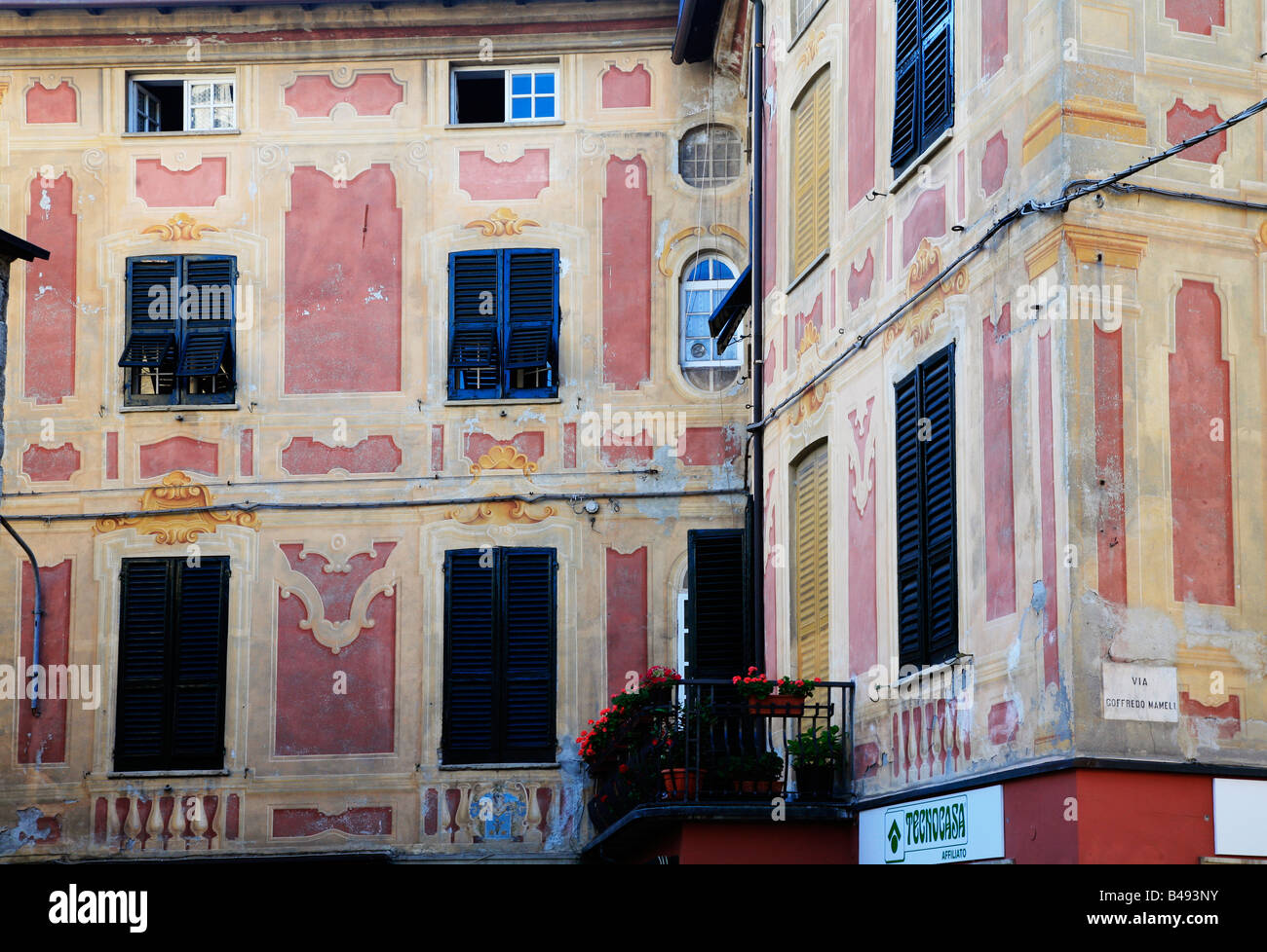 Painted building facades in Gavi, Piemonte, Italy Stock Photo
