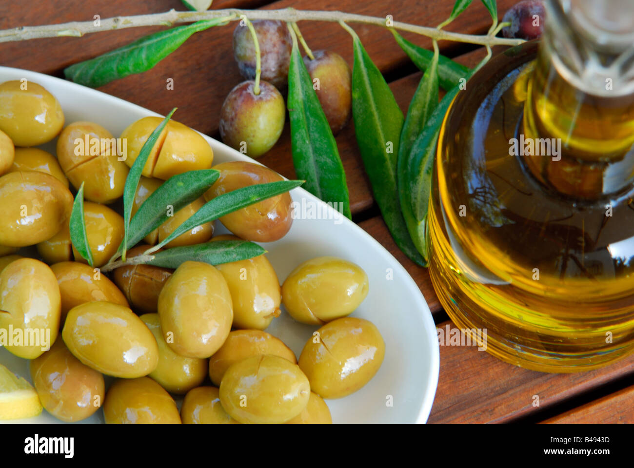 green olive in the plate Stock Photo Alamy