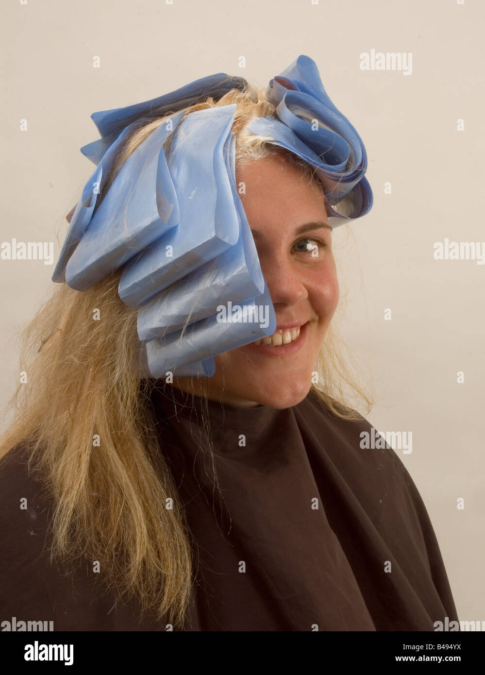 Woman hair dye foils hi-res stock photography and images - Alamy