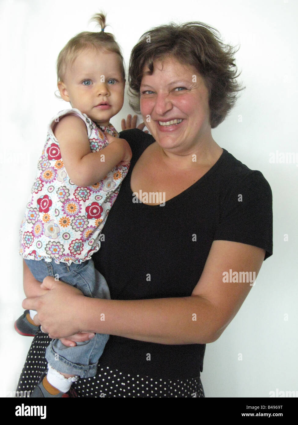 Portrait of smiling mother and child Stock Photo - Alamy
