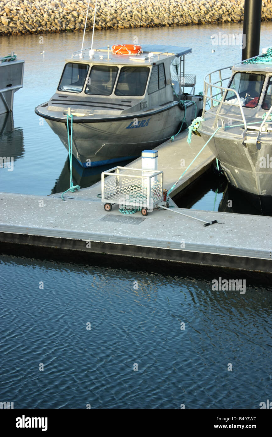 a mariner with workboats for aquaculture in the spencer gulf on the eyre peninsula Stock Photo